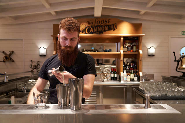 Loose Cannon bartender making a drink - JJ Travel Associates - Best Travel Agents in NJ