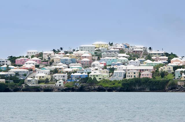 boat-tour-1 - JJ Travel Associates - Best Travel Agents in NJ Colorful houses along the coast