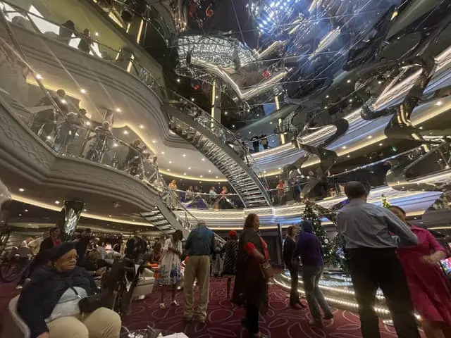 atrium-meraviglia - JJ Travel Associates - Best Travel Agents in NJ Atrium full of people on MSG Meraviglia