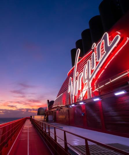 Virgin-Superbowl - JJ Travel Associates - Best Travel Agents in NJ Virgin cruise at night for the Superbowl at Sea